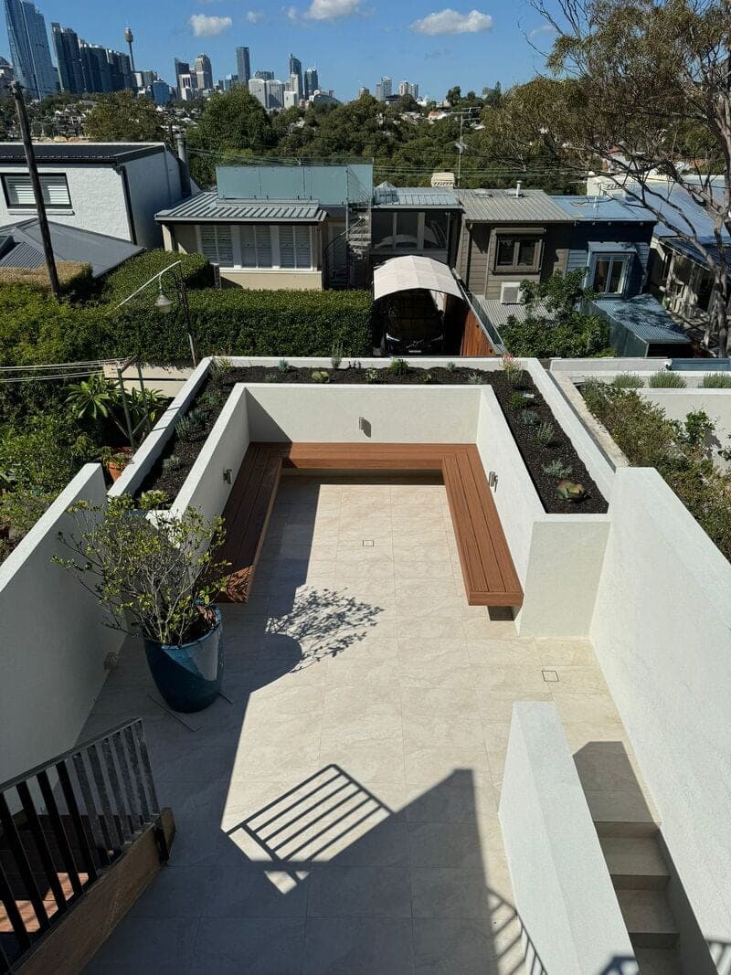 Rendered courtyard planters and built-in seating in Birchgrove